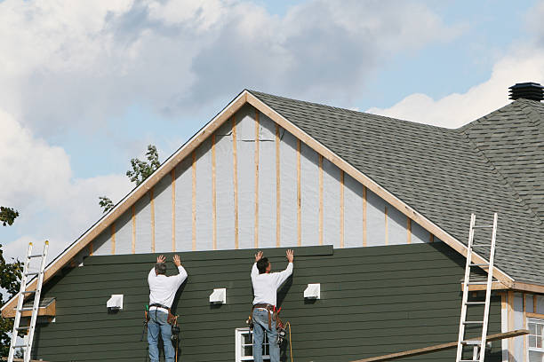 Professional Siding Contractor technician working in Sharon, PA